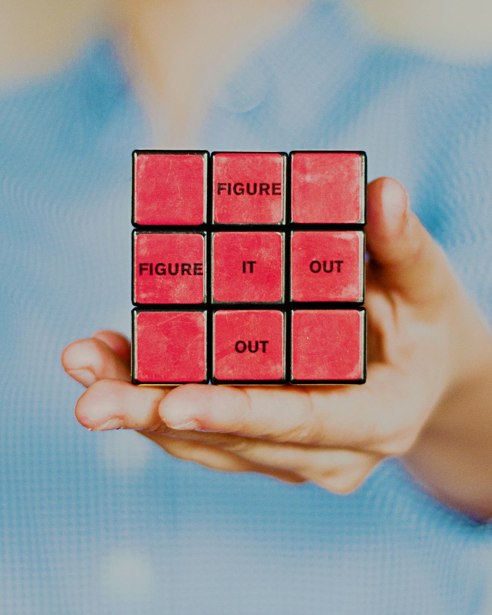 A 3 by 3 Rubik's cube, representing the multi-layer structure of the MKDM Brand Memory Pre-Flight Audit Framework